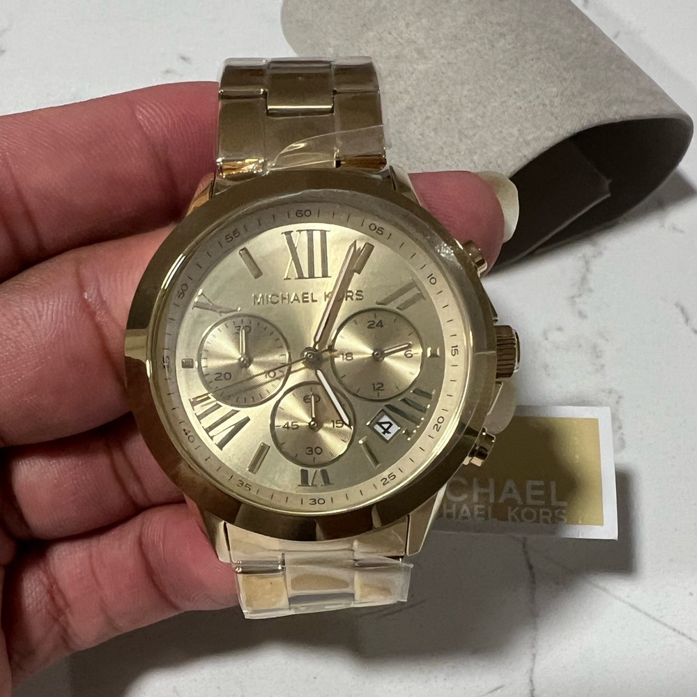 Women’s gold Michael Kors Watch